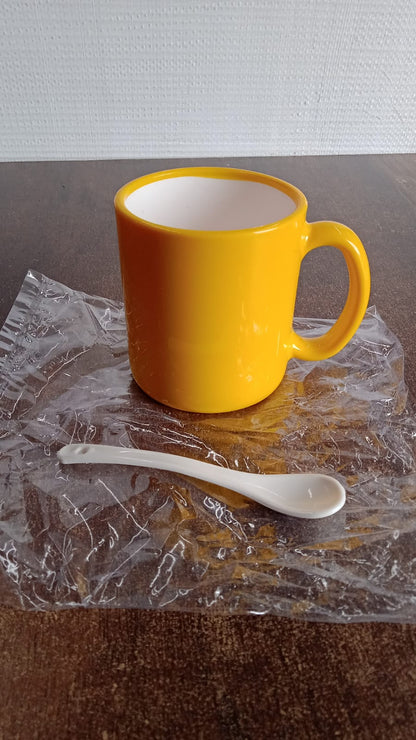 Elegant Ceramic Mug with Matching Spoon